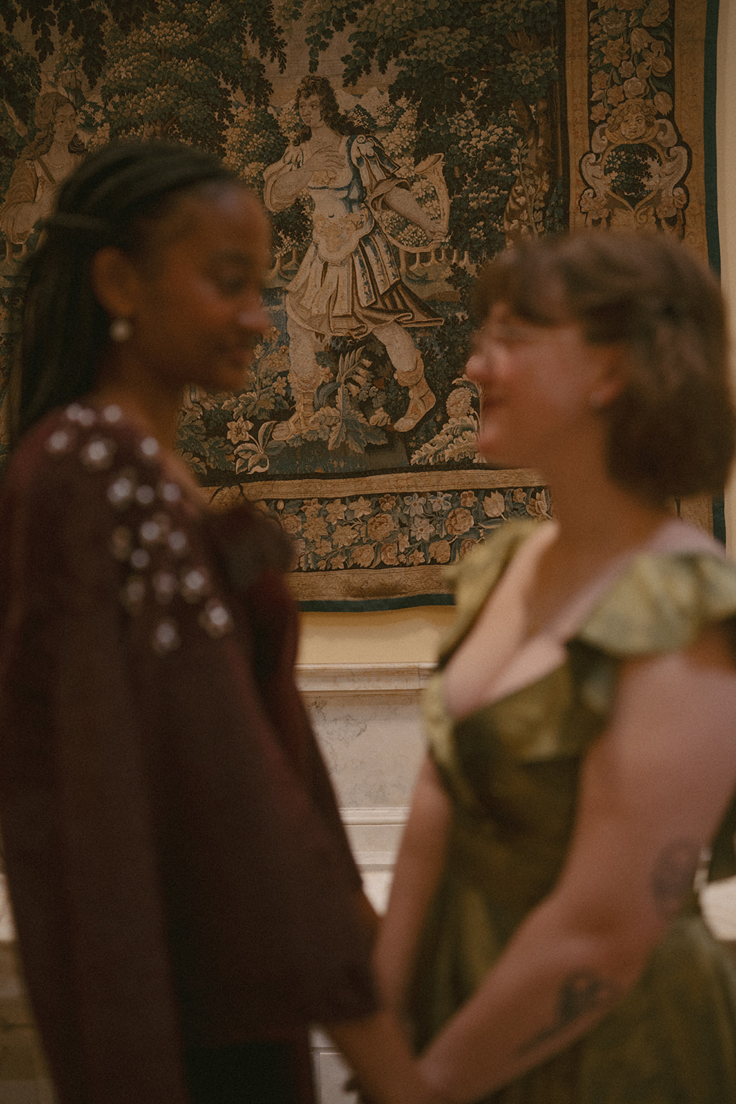 A couple on a date at The Walters Museum of Art getting their photos taken by a wedding and elopement photographer